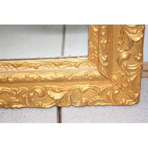 367 - A vintage carved wooden gilt framed mirror, approx 77cm x 56cm and a Rococo style oval wall mirror w... 