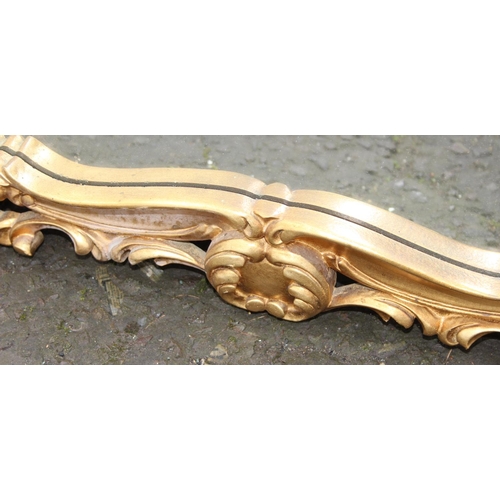 371 - An extremely large Rococo style wall mirror with pierced gilt frame, approx 143cm x 80cm