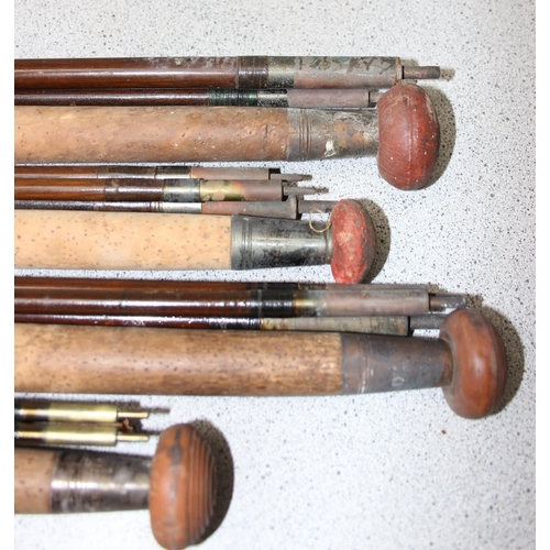 704 - Qty of vintage fishing rods to include 4 interesting C Farlow Hold Fast fishing rods, some with inte... 