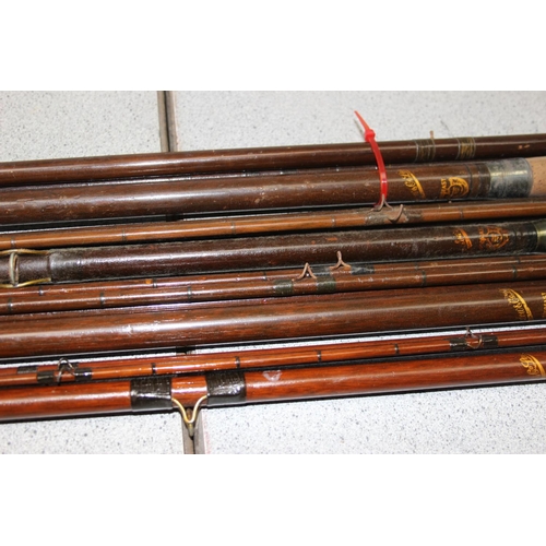 704 - Qty of vintage fishing rods to include 4 interesting C Farlow Hold Fast fishing rods, some with inte... 