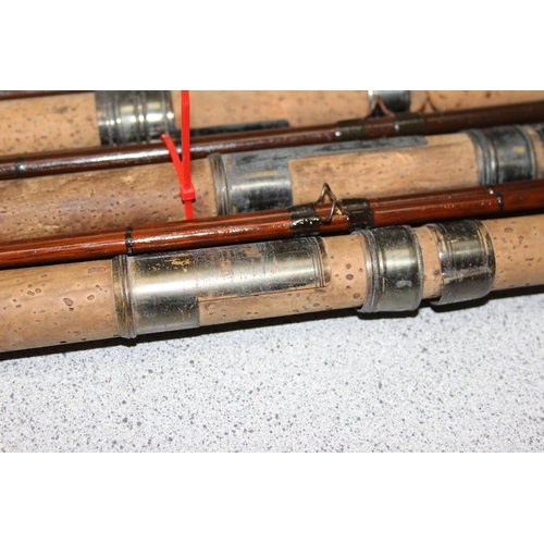 704 - Qty of vintage fishing rods to include 4 interesting C Farlow Hold Fast fishing rods, some with inte... 