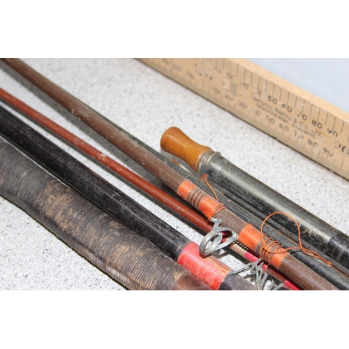 704 - Qty of vintage fishing rods to include 4 interesting C Farlow Hold Fast fishing rods, some with inte... 