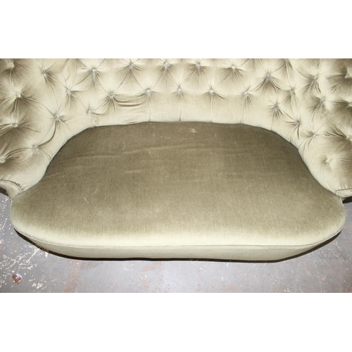 76 - Antique button back two seater sofa, sprung seats with later upholstery approx width 150cm