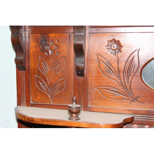 81 - Mahogany framed over mantle mirror with floral engraving and turned supports, approx width 110cm