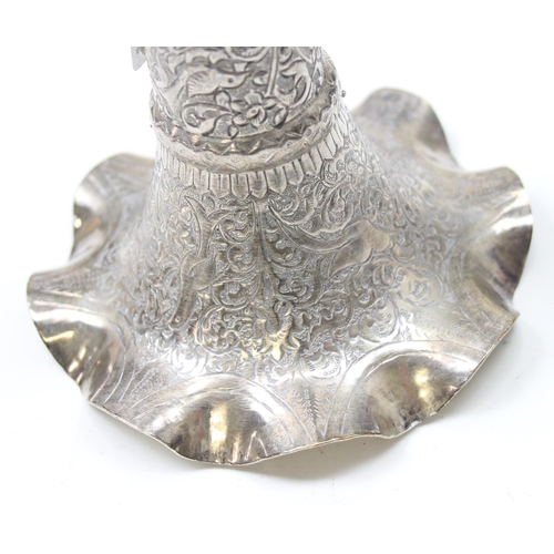 1043 - An Indian silver vase with embossed decoration and flared rim, XRF tested approx 93% pure, approx 21... 