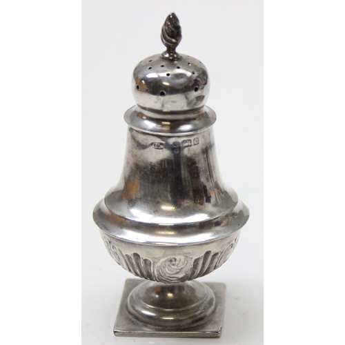 1044 - A small pepper pot, Birmingham 1927 by William Devonport and a silver salt, Birmingham 1907 by the s... 