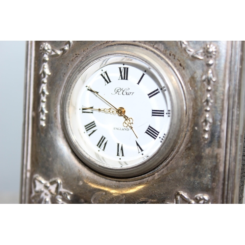 1046 - Small silver desk clock with easel back, hallmarked for Sheffield 1994