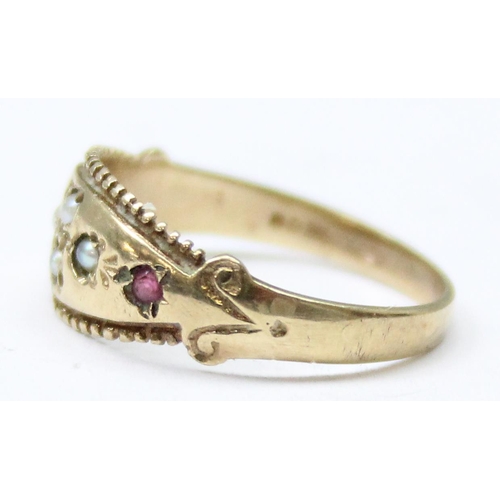 1136 - A 9ct gold seed pearl and ruby gypsy set ring, approx size I, approx 1.58g gross