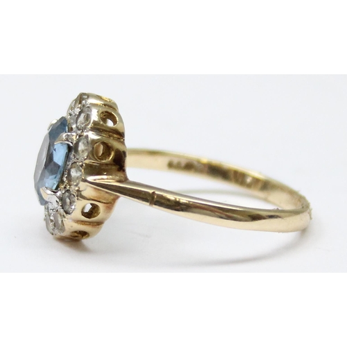 1139 - 9ct gold floral set with central light blue stone surrounded by white stones, approx size Q, approx ... 