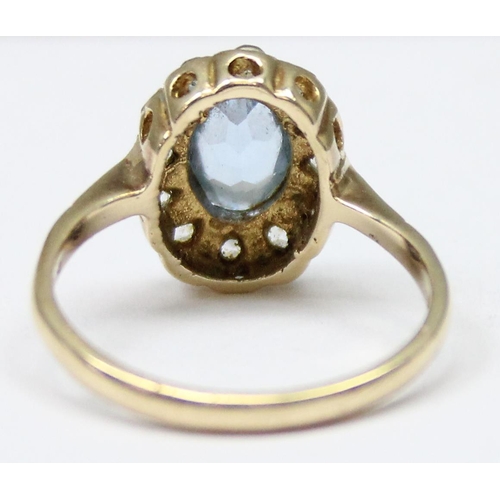 1139 - 9ct gold floral set with central light blue stone surrounded by white stones, approx size Q, approx ... 