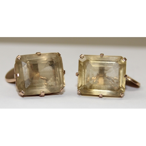 1143 - A pair of impressive 9ct gold mounted cufflinks with cut stones, marked 9k and XRF confirmed as 9ct ... 