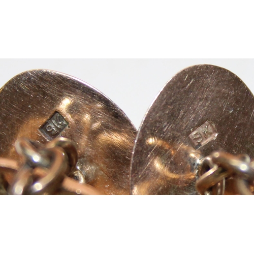 1143 - A pair of impressive 9ct gold mounted cufflinks with cut stones, marked 9k and XRF confirmed as 9ct ... 