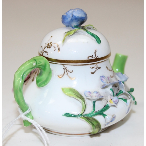 1635 - An extremely rare 19th century squat pear shaped miniature teapot and cover, likely by Rockingham bu... 