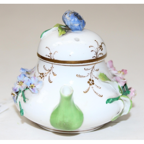 1635 - An extremely rare 19th century squat pear shaped miniature teapot and cover, likely by Rockingham bu... 