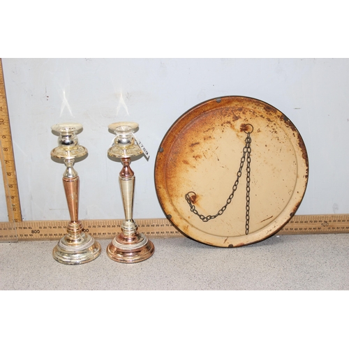 1789 - A pair of silver plated candlesticks and a vintage copper effect framed mirror