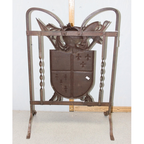 1792 - A decorative wrought iron heraldic fire guard