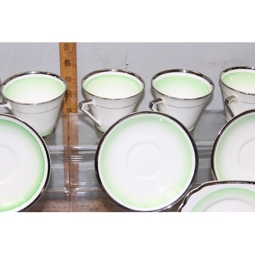 1799 - An Art Deco period tea set with chrome edging by Bell Bone China