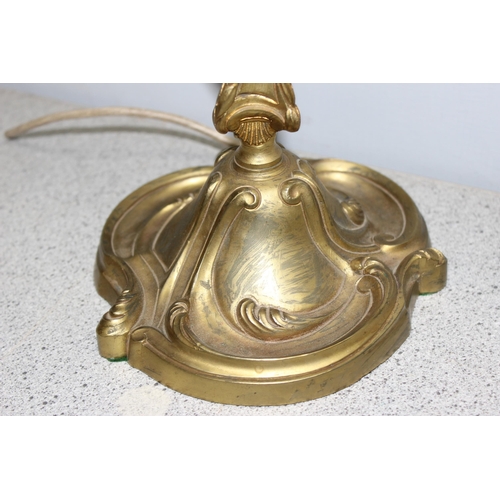 245 - An antique Art Nouveau gilt brass table lamp, approx 34cm tall