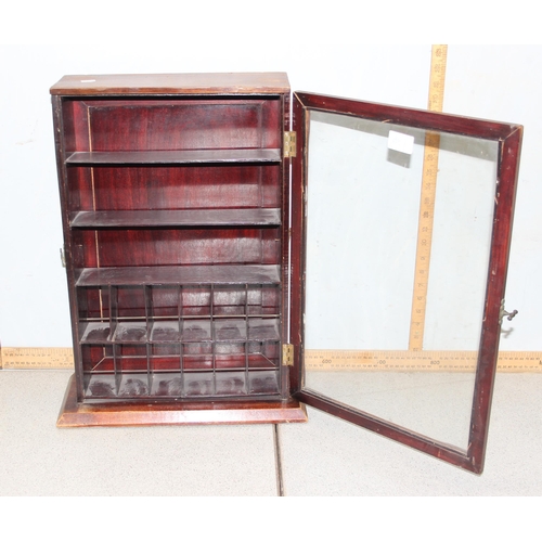 285 - An unusual glazed wooden table top display case with opening back and front with various compartment... 