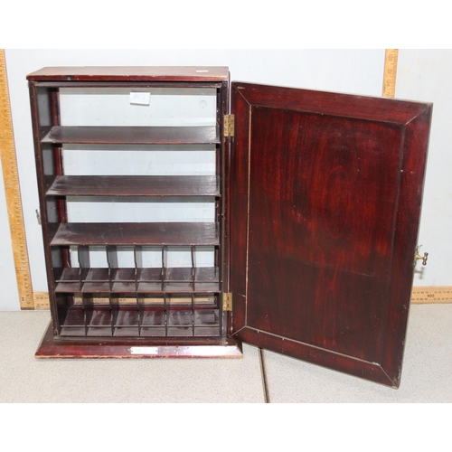 285 - An unusual glazed wooden table top display case with opening back and front with various compartment... 