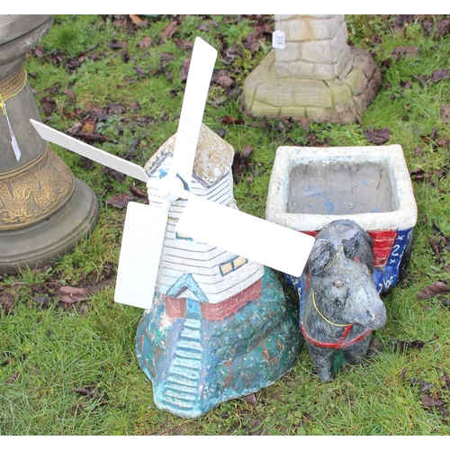 312 - 2 concrete garden ornaments to include windmill & donkey pulling a cart