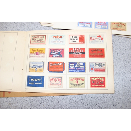 522 - A large qty of assorted vintage advertising match boxes in albums, many hundreds