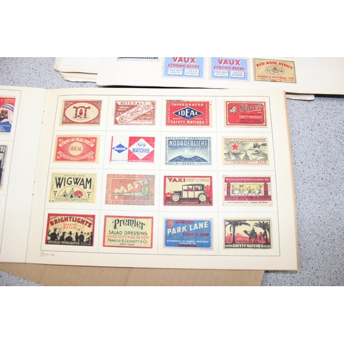 522 - A large qty of assorted vintage advertising match boxes in albums, many hundreds