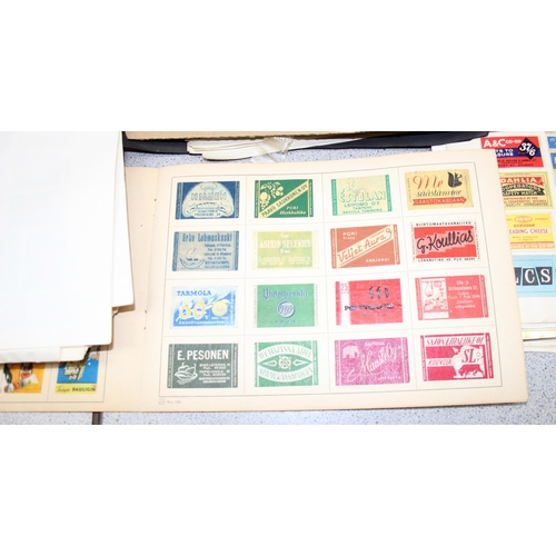 522 - A large qty of assorted vintage advertising match boxes in albums, many hundreds