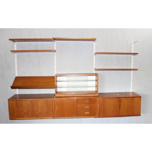 1 - A rare set of original 1960's Ikea Poul Cadovius style modular wall shelves and cupboards, purchased... 