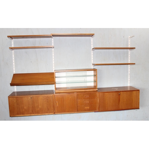 1 - A rare set of original 1960's Ikea Poul Cadovius style modular wall shelves and cupboards, purchased... 