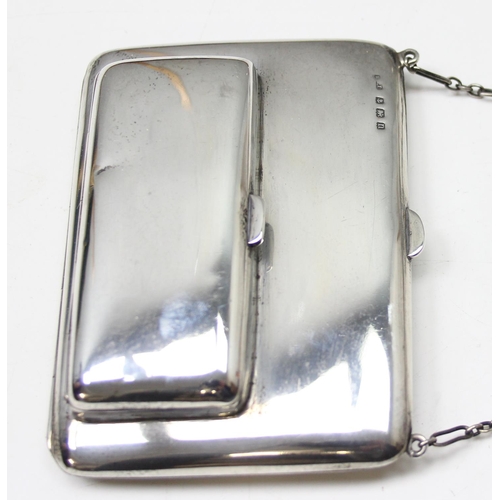 1001 - An early 20th century silver combination coin purse and aide memoire with leather interior and silve... 