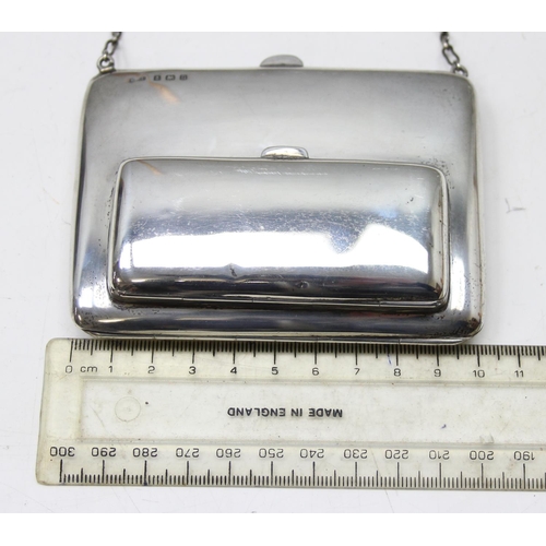 1001 - An early 20th century silver combination coin purse and aide memoire with leather interior and silve... 