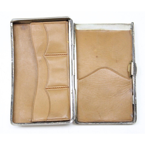 1006 - An antique silver card case of slightly curved form with leather lined interior, Birmingham 1901 by ... 