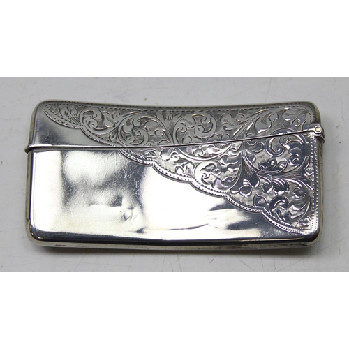 1007 - An antique silver card case of slightly curved form with engraved decoration, Birmingham 1904 by Jon... 