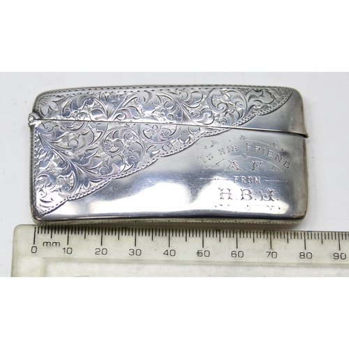 1007 - An antique silver card case of slightly curved form with engraved decoration, Birmingham 1904 by Jon... 