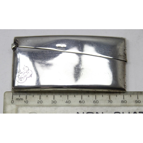 1008 - An antique plain silver card case of slightly curved form, Birmingham 1912 makers mark rubbed, appro... 