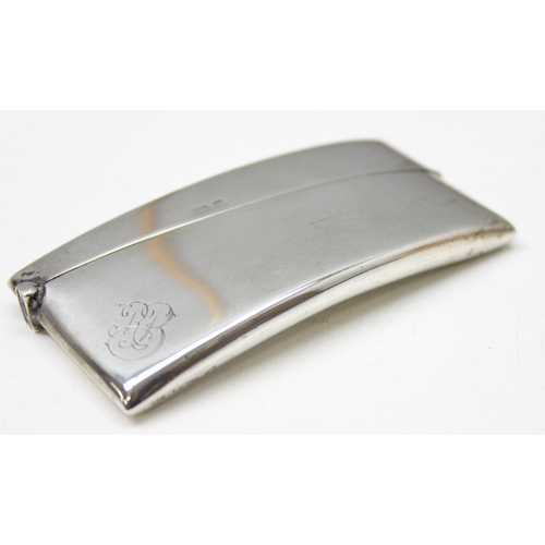 1008 - An antique plain silver card case of slightly curved form, Birmingham 1912 makers mark rubbed, appro... 