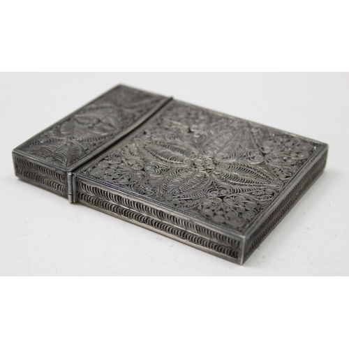 1009 - An antique silver filigree card case, likely late 19th century, bearing indistinct marks but XRF tes... 