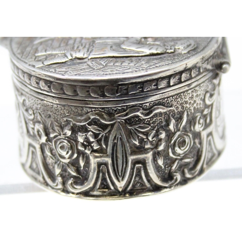 1013 - An antique Dutch 930 silver tobacco or snuff box decorated with an embossed tavern scene, marks to b... 