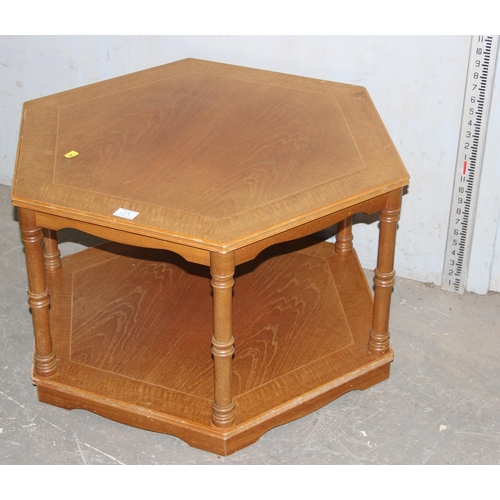 114 - Mid-century polished bi-folding door cupboard on legs with a light oak legate coffee table (2), cupb... 