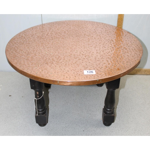 126 - Circular coffee table with hammered copper top, approx width 60cm