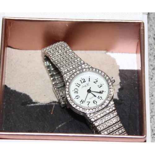 1344 - 10 assorted modern boxed watches to inc Diamonque & Eternity etc