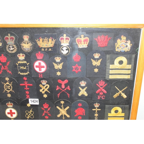 1424 - Framed collection of over 50 20th century Royal navy patches