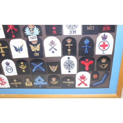 1425 - Framed collection of 50 20th century Royal Navy patches