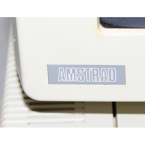 1568 - A vintage Amstrad PC1640DD personal computer, with a PC-MD monitor, PC1640 keyboard, DMP3160 printer... 