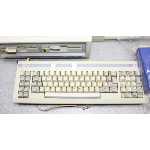 1568 - A vintage Amstrad PC1640DD personal computer, with a PC-MD monitor, PC1640 keyboard, DMP3160 printer... 