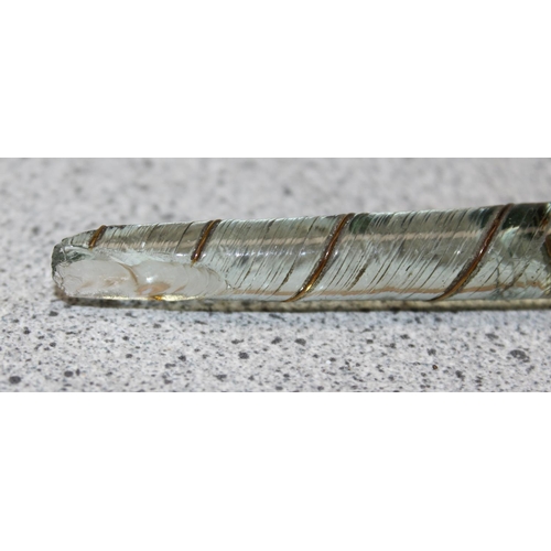 1686 - An antique Nailsea glass cane, approx 74cm long