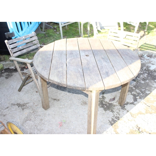 339 - Round slated teak garden table and 2 teak folding chairs, approx diameter 114cm