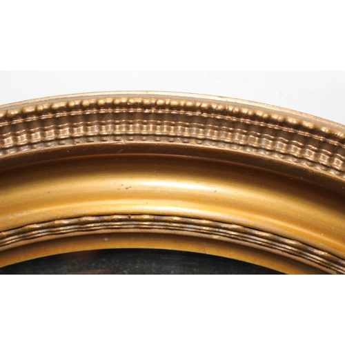 430 - Gilt framed oval mirror approx. 50cm in diameter