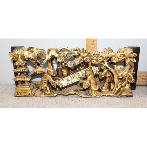 431 - Pair of Chinese carved wooden reliefs with gilt painted finish